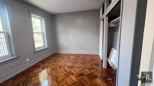 a view of an empty room and window