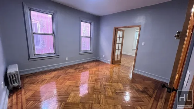 a view of an empty room and window