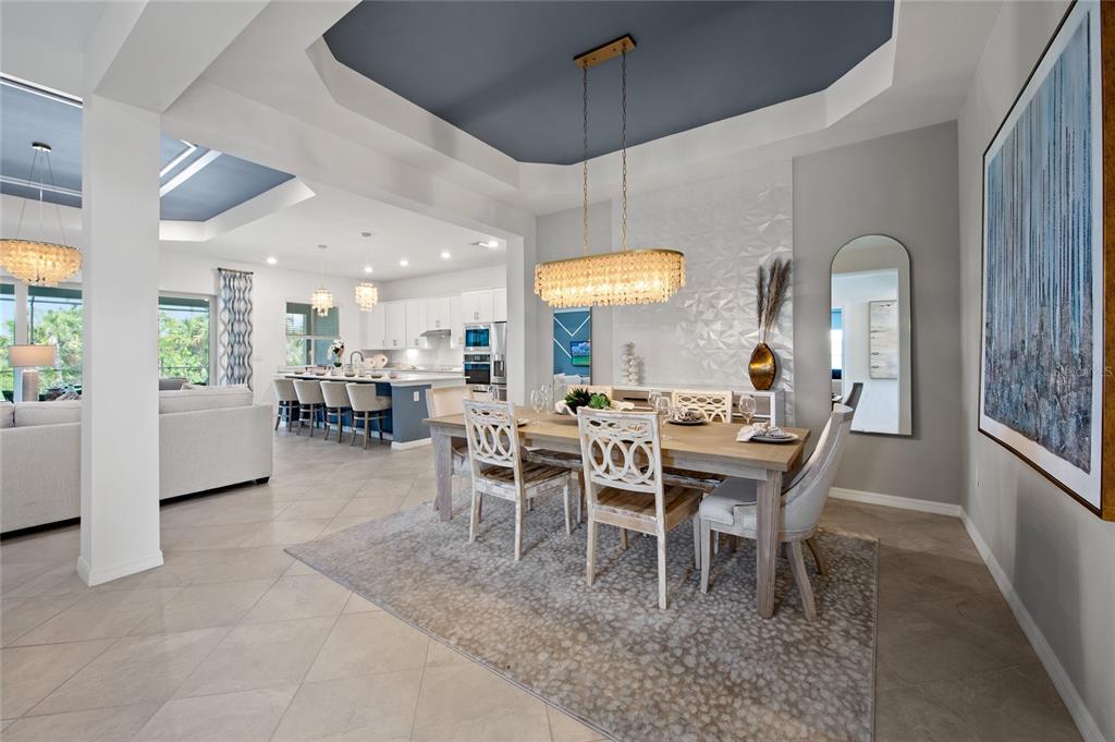 7161 Inlet Isles Lakewood Ranch, FL 34202 - Photo 16 of 29 a view of a dining room with furniture