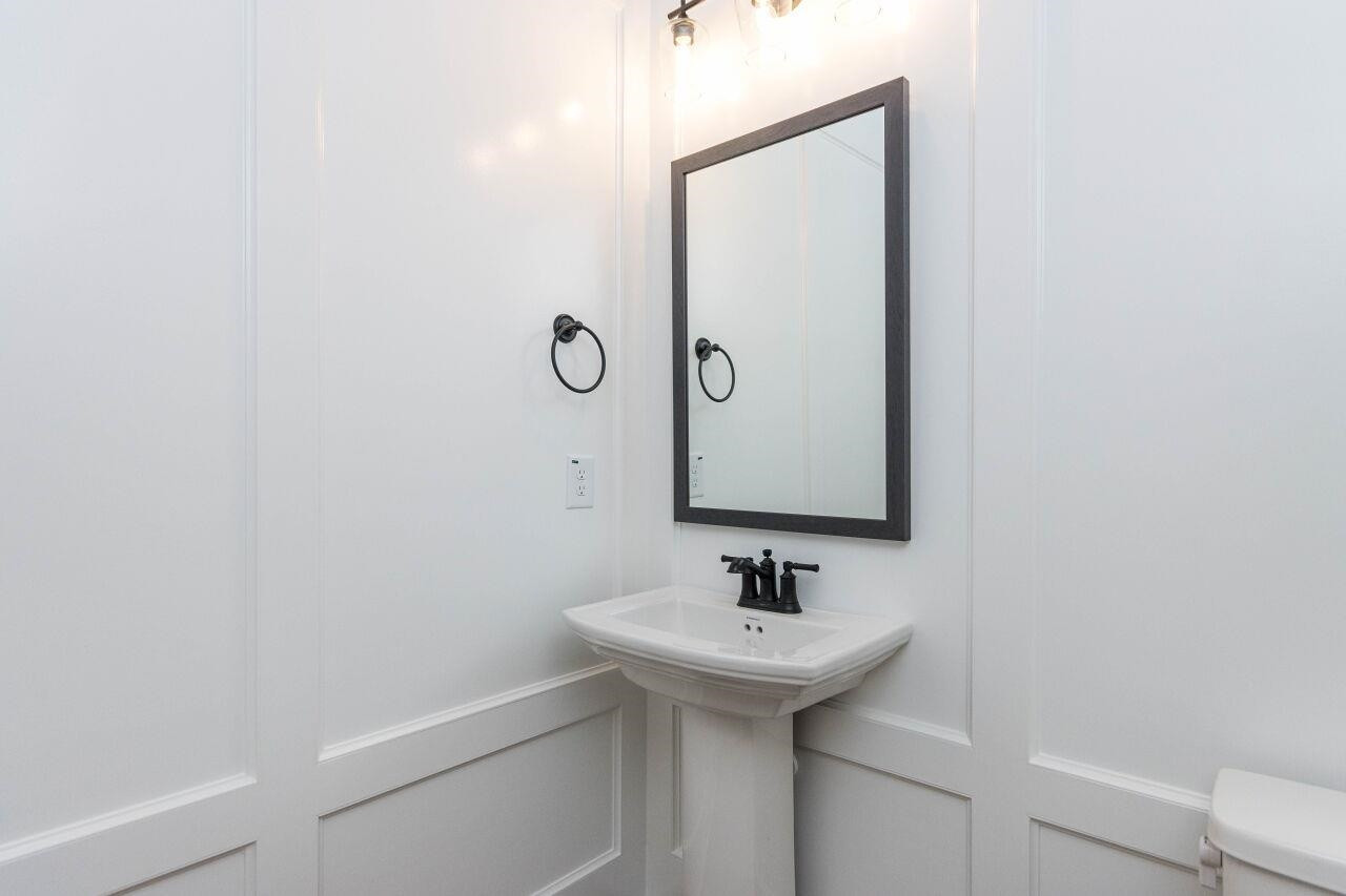 1108 Kentlands Drive Durham, NC 27713 - Photo 13 of 49 a bathroom with a sink and mirror