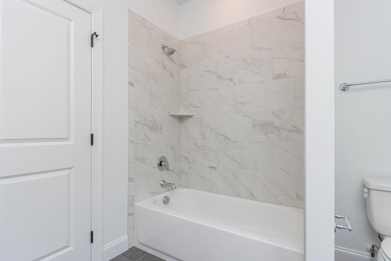 1108 Kentlands Drive Durham, NC 27713 - Photo 18 of 49 a bathroom with a bathtub