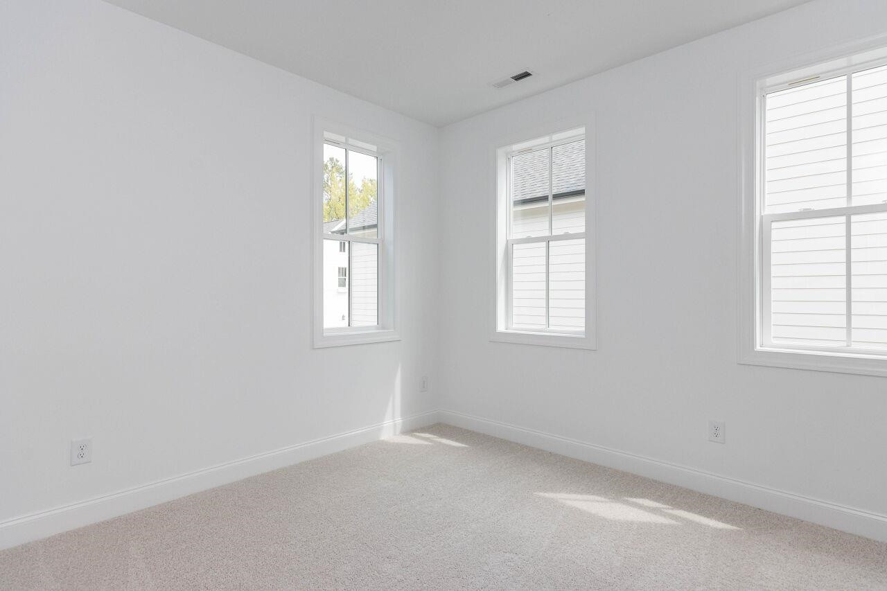 1108 Kentlands Drive Durham, NC 27713 - Photo 20 of 49 an empty room with windows