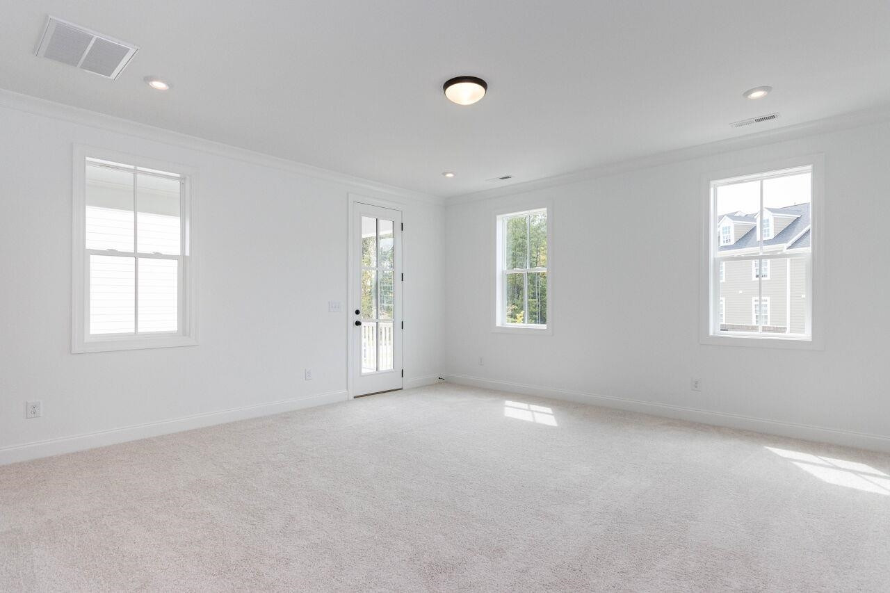 1108 Kentlands Drive Durham, NC 27713 - Photo 24 of 49 an empty room with windows