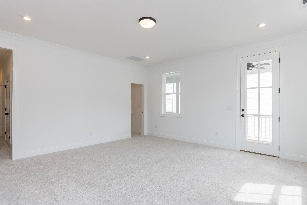 1108 Kentlands Drive Durham, NC 27713 - Photo 25 of 49 an empty room with windows and closet
