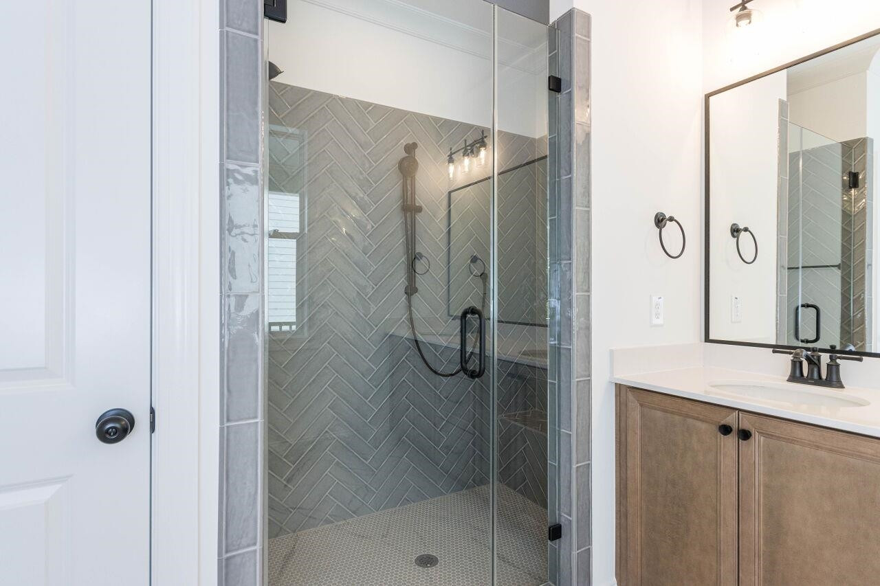 1108 Kentlands Drive Durham, NC 27713 - Photo 29 of 49 a bathroom with a shower and a sink