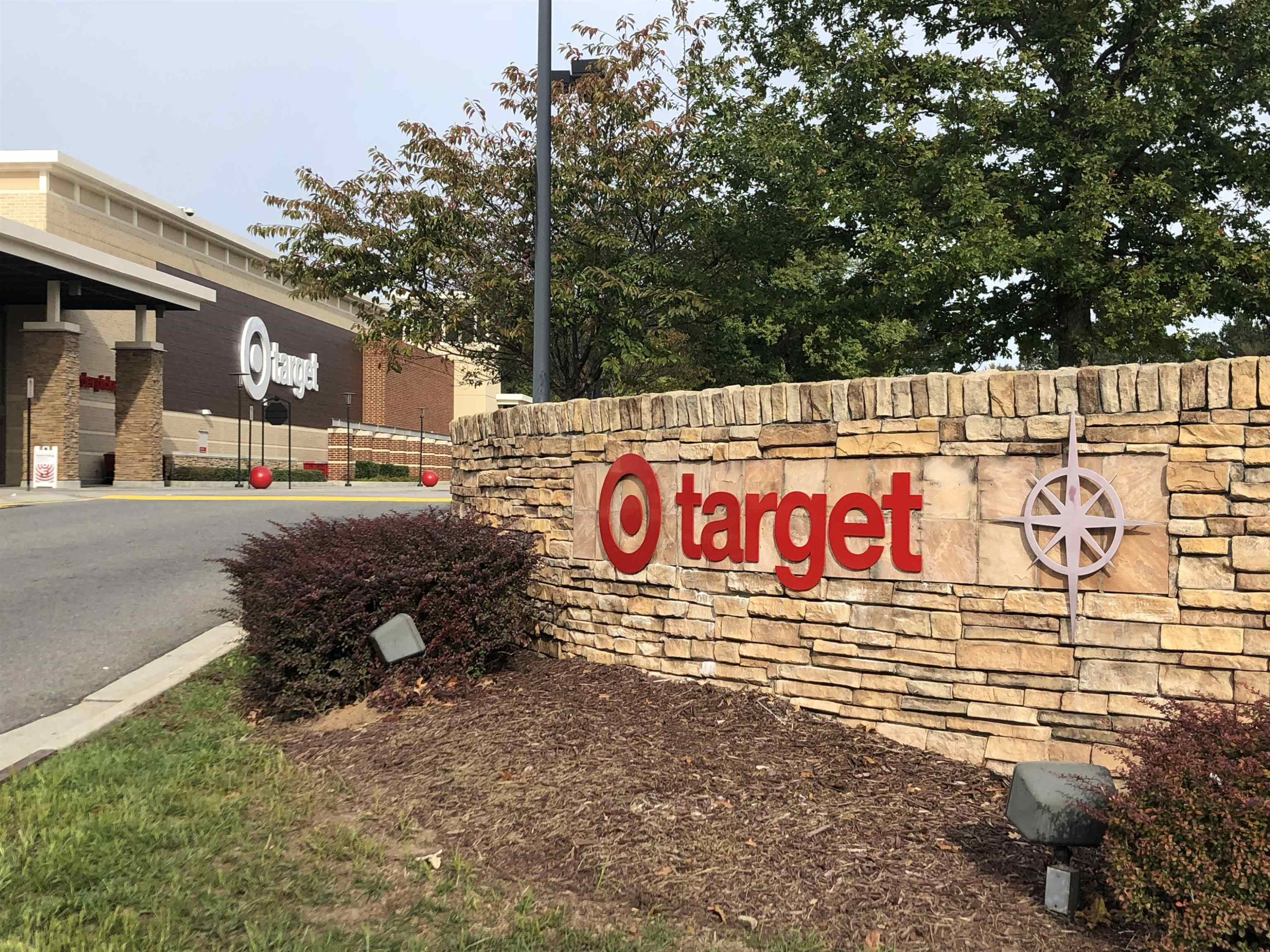 1108 Kentlands Drive Durham, NC 27713 - Photo 46 of 49 a street sign on a wall next to a road