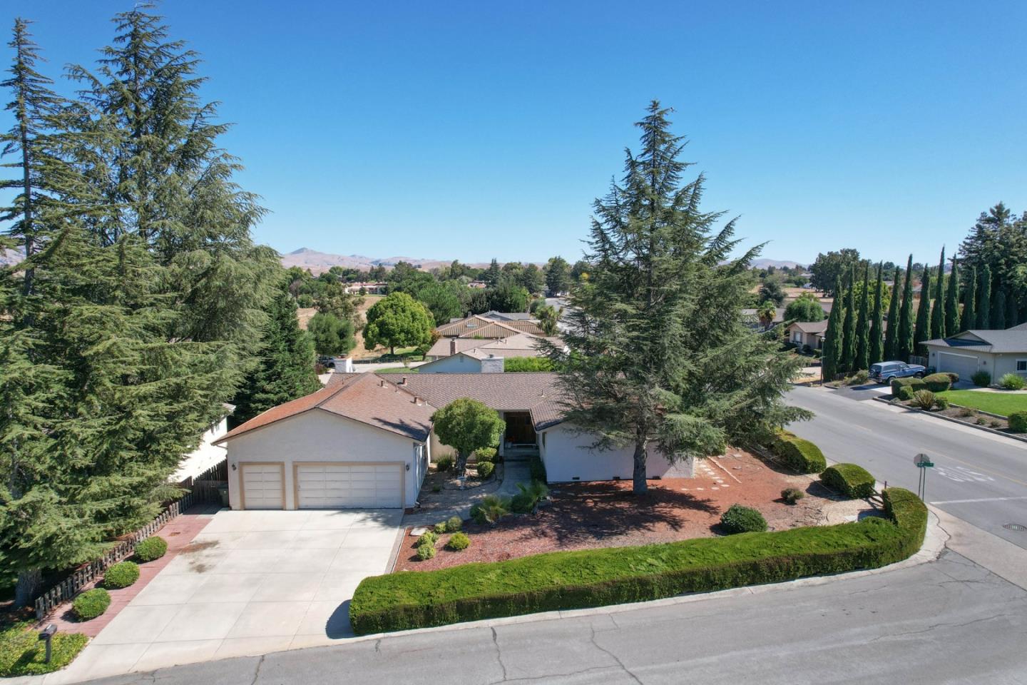 15 Rays Circle Hollister, CA 95023 - Photo 1 of 41 a front view of a house with a yard and garage