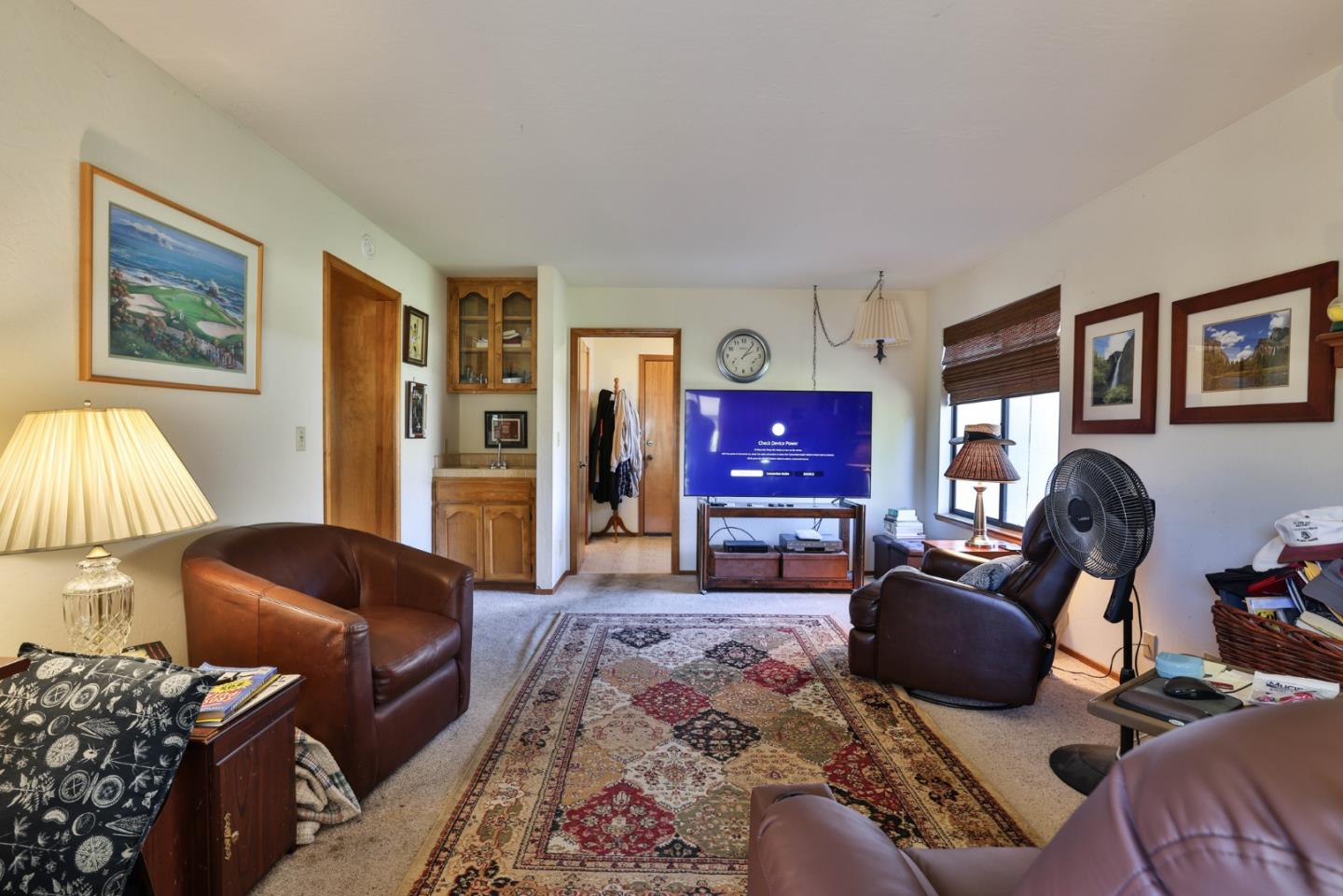 15 Rays Circle Hollister, CA 95023 - Photo 12 of 41 a living room with furniture ceiling fan and a window