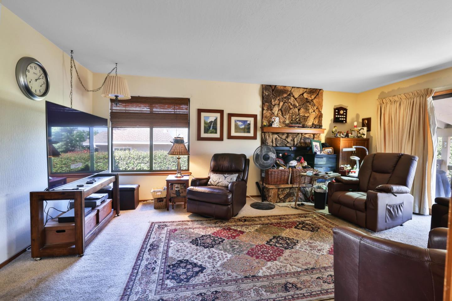 15 Rays Circle Hollister, CA 95023 - Photo 13 of 41 a living room with furniture large window and a flat screen tv
