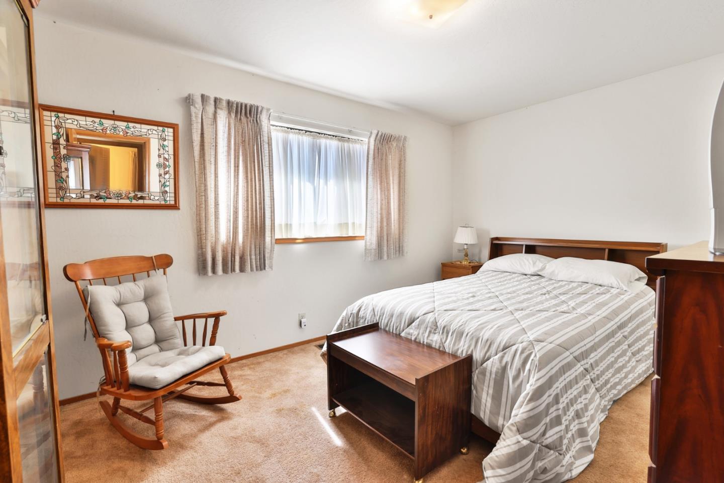 15 Rays Circle Hollister, CA 95023 - Photo 24 of 41 a bedroom with a bed and chair