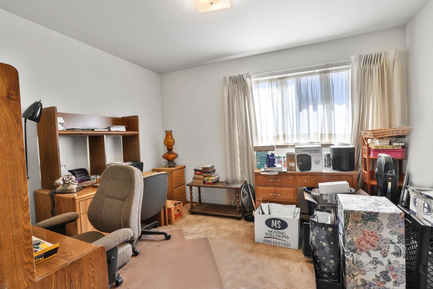 15 Rays Circle Hollister, CA 95023 - Photo 27 of 41 a room with furniture and a window