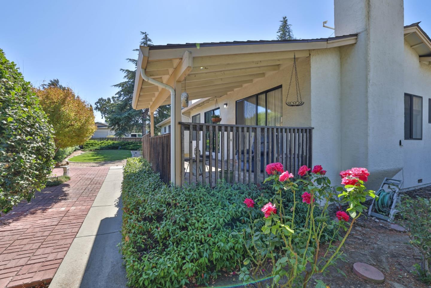 15 Rays Circle Hollister, CA 95023 - Photo 34 of 41 a view of a house with a flower garden