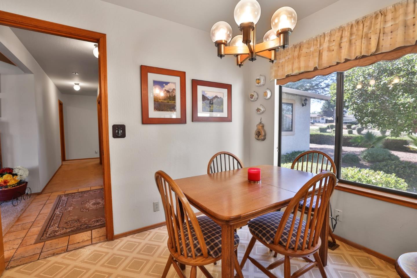 15 Rays Circle Hollister, CA 95023 - Photo 8 of 41 a dining room with furniture a chandelier and wooden floor