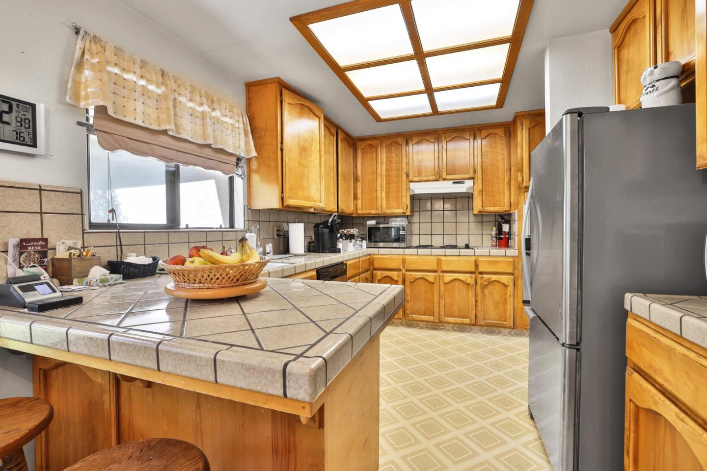 15 Rays Circle Hollister, CA 95023 - Photo 9 of 41 a large kitchen with a large window