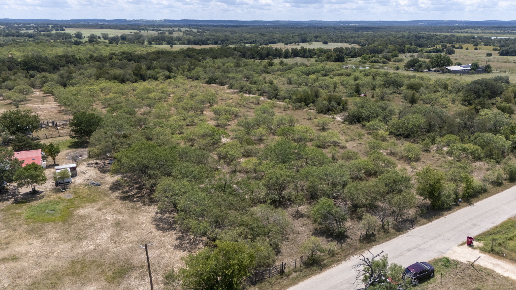 Tbd Fox Lane Lockhart, TX 78644 - Photo 20 of 35 an aerial view of a house with a yard