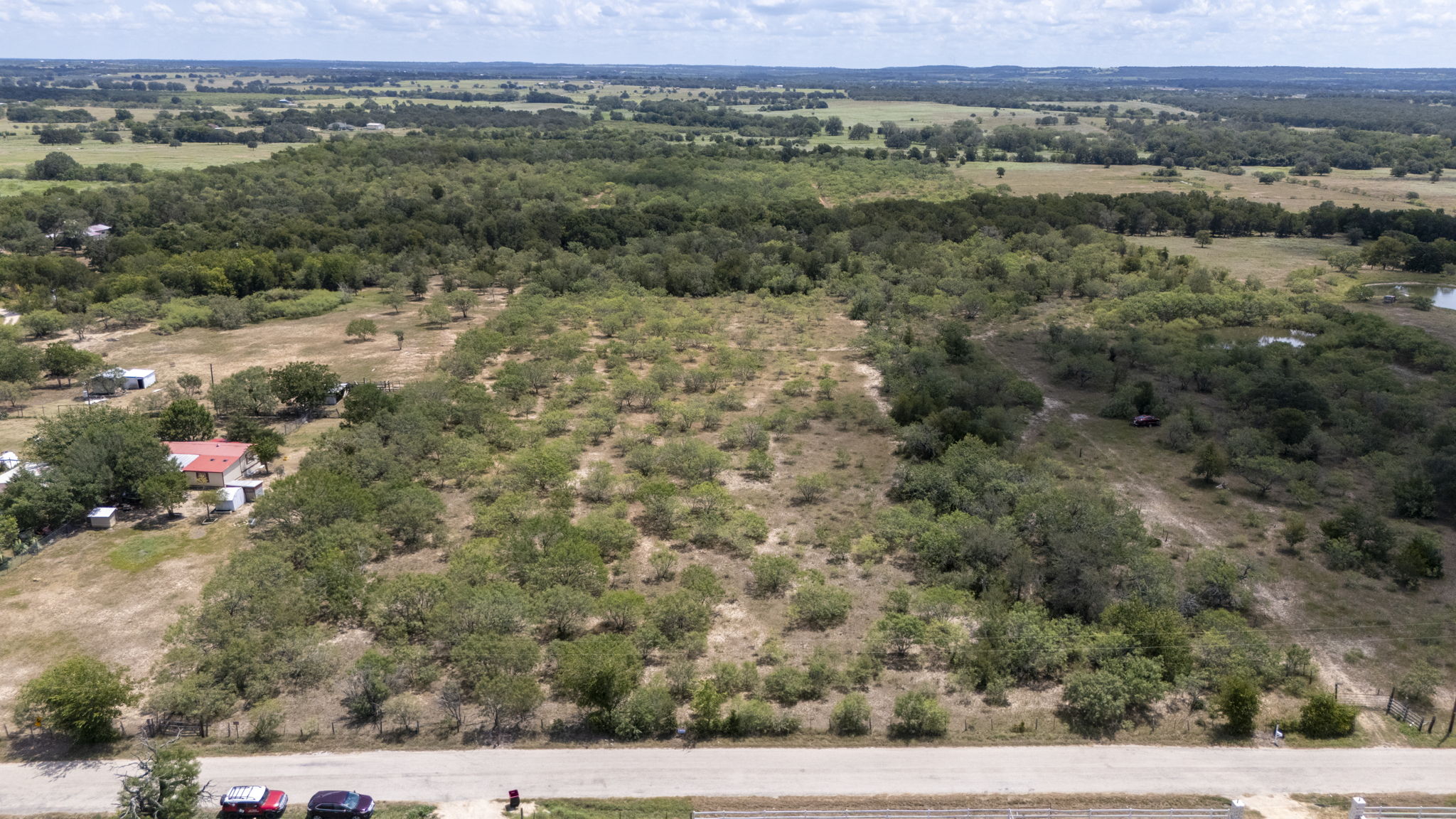Tbd Fox Lane Lockhart, TX 78644 - Photo 26 of 35 an aerial view of a house with a yard