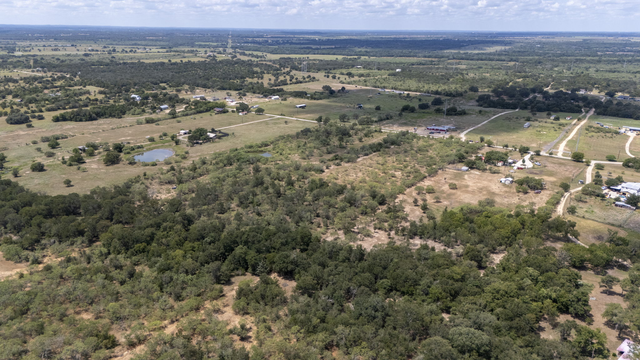 Tbd Fox Lane Lockhart, TX 78644 - Photo 6 of 35 an aerial view of mountain with lake view