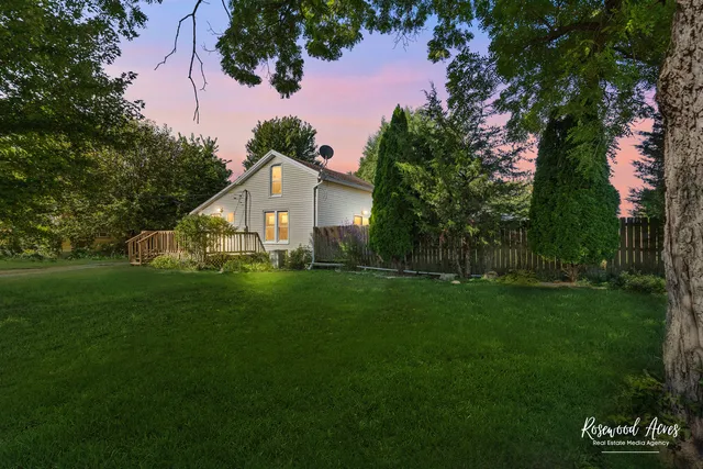 a view of a house and garden