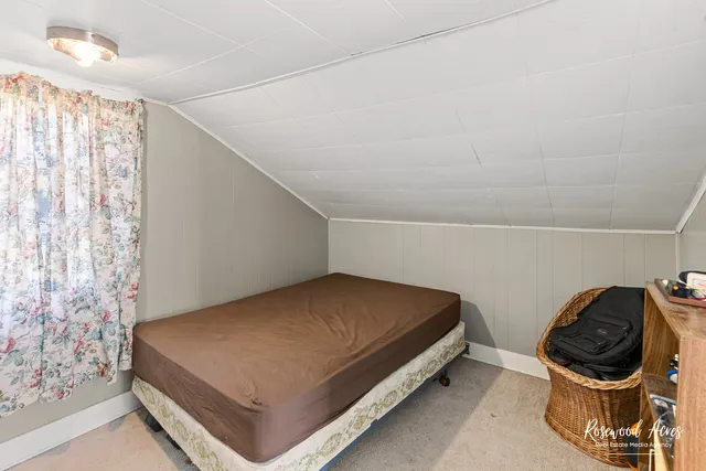 a bathroom with a sink and a window