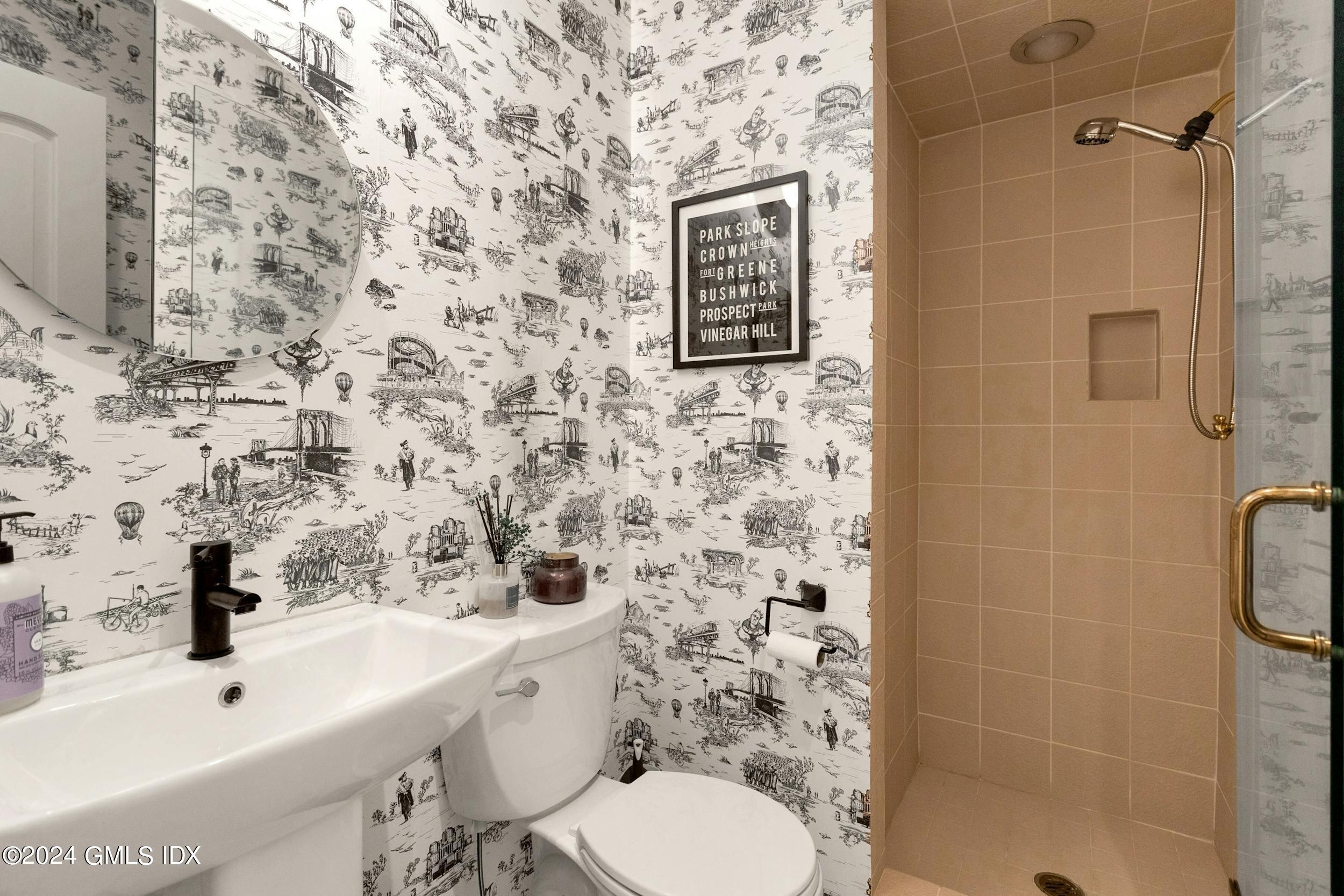 12 Guinea Road Greenwich, CT 06830 - Photo 16 of 38 a bathroom with a sink and a toilet