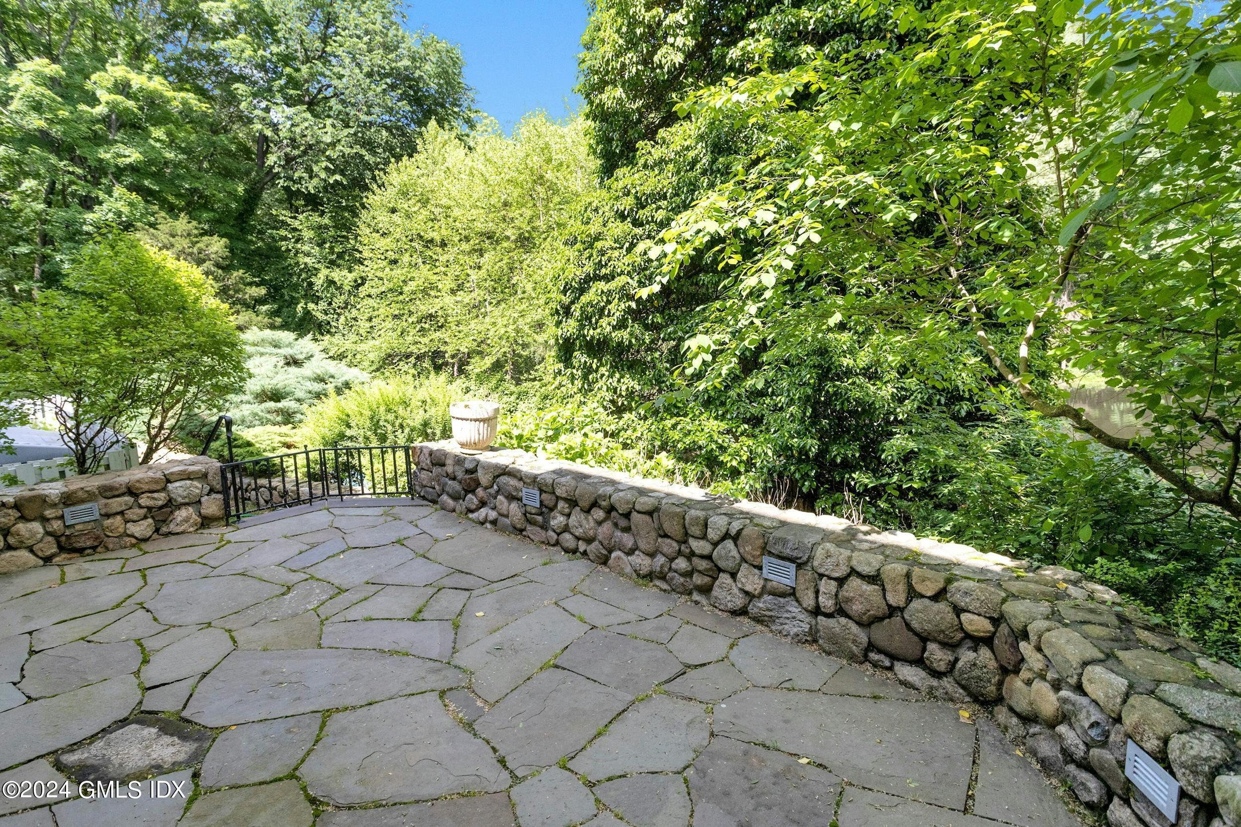 12 Guinea Road Greenwich, CT 06830 - Photo 32 of 38 a view of an outdoor space and garden view