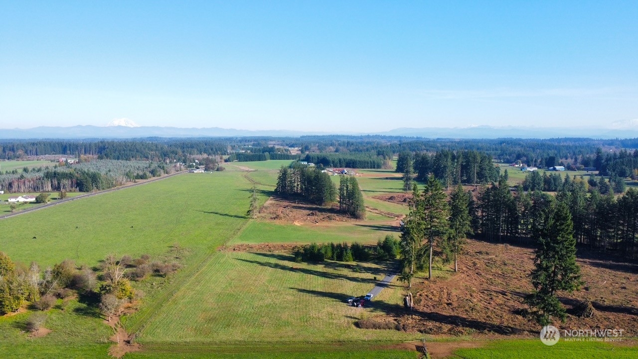 168 Racyn Lane Winlock, WA 98596 - Photo 4 of 8 an aerial view of a house with a garden