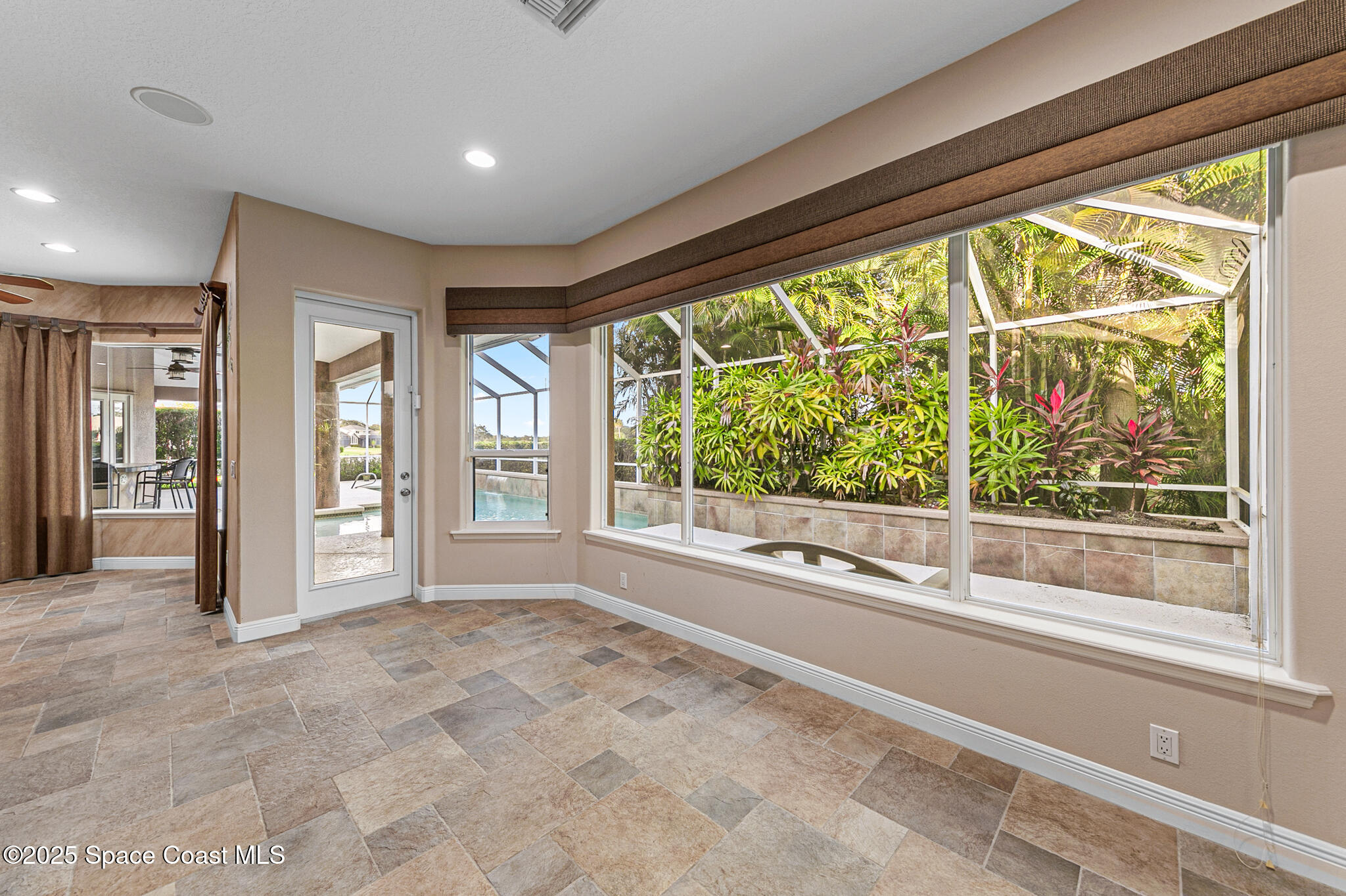 425 Baytree Drive Melbourne, FL 32940 - Photo 12 of 53 a view of an empty room and window