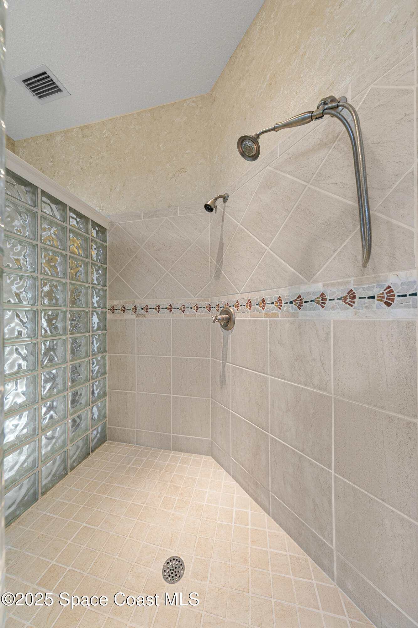 425 Baytree Drive Melbourne, FL 32940 - Photo 24 of 53 a bathroom with a shower