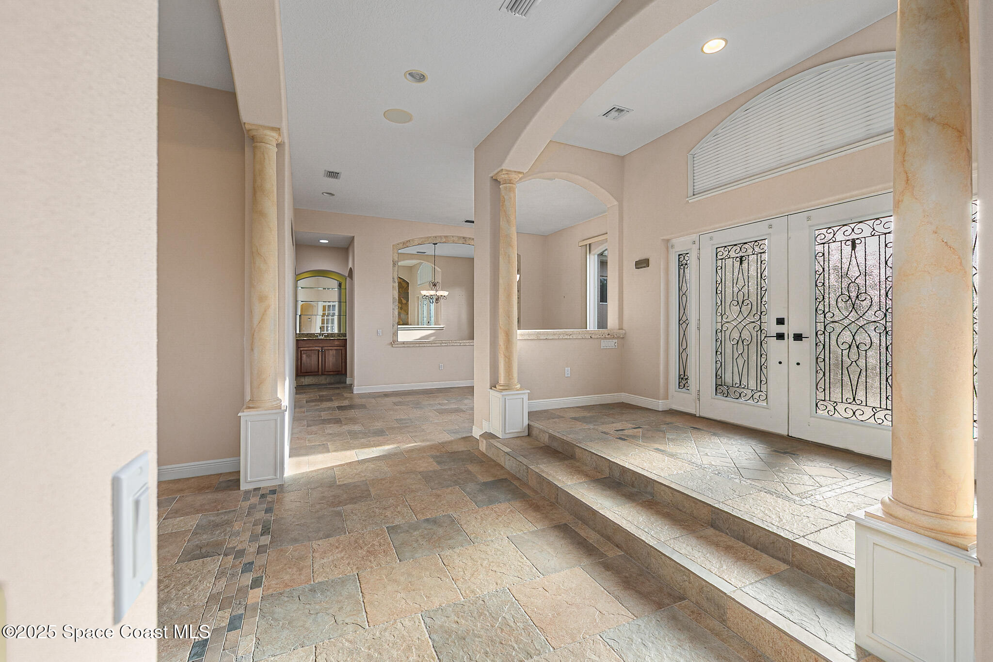 425 Baytree Drive Melbourne, FL 32940 - Photo 4 of 53 a view of entryway with white walls