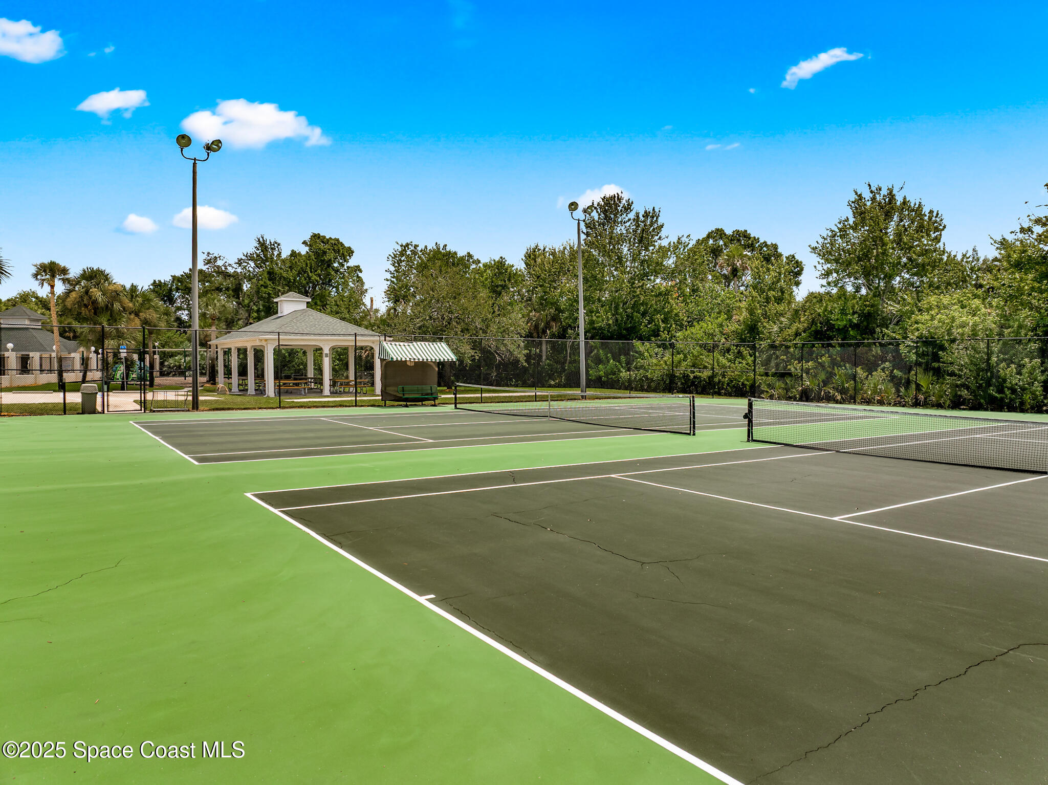 425 Baytree Drive Melbourne, FL 32940 - Photo 44 of 53 a view of a tennis court