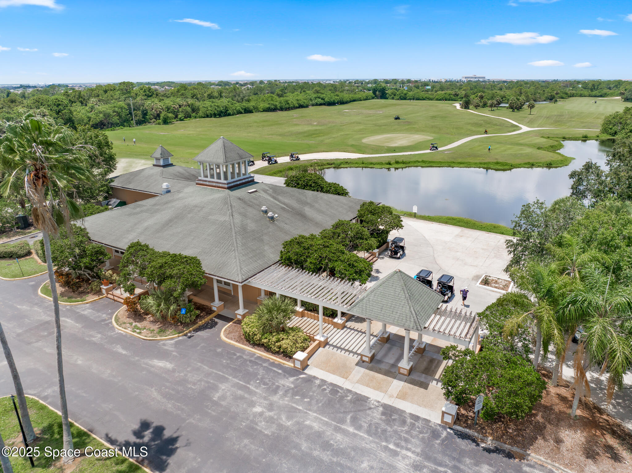 425 Baytree Drive Melbourne, FL 32940 - Photo 47 of 53 an aerial view of a garden with an outdoor space