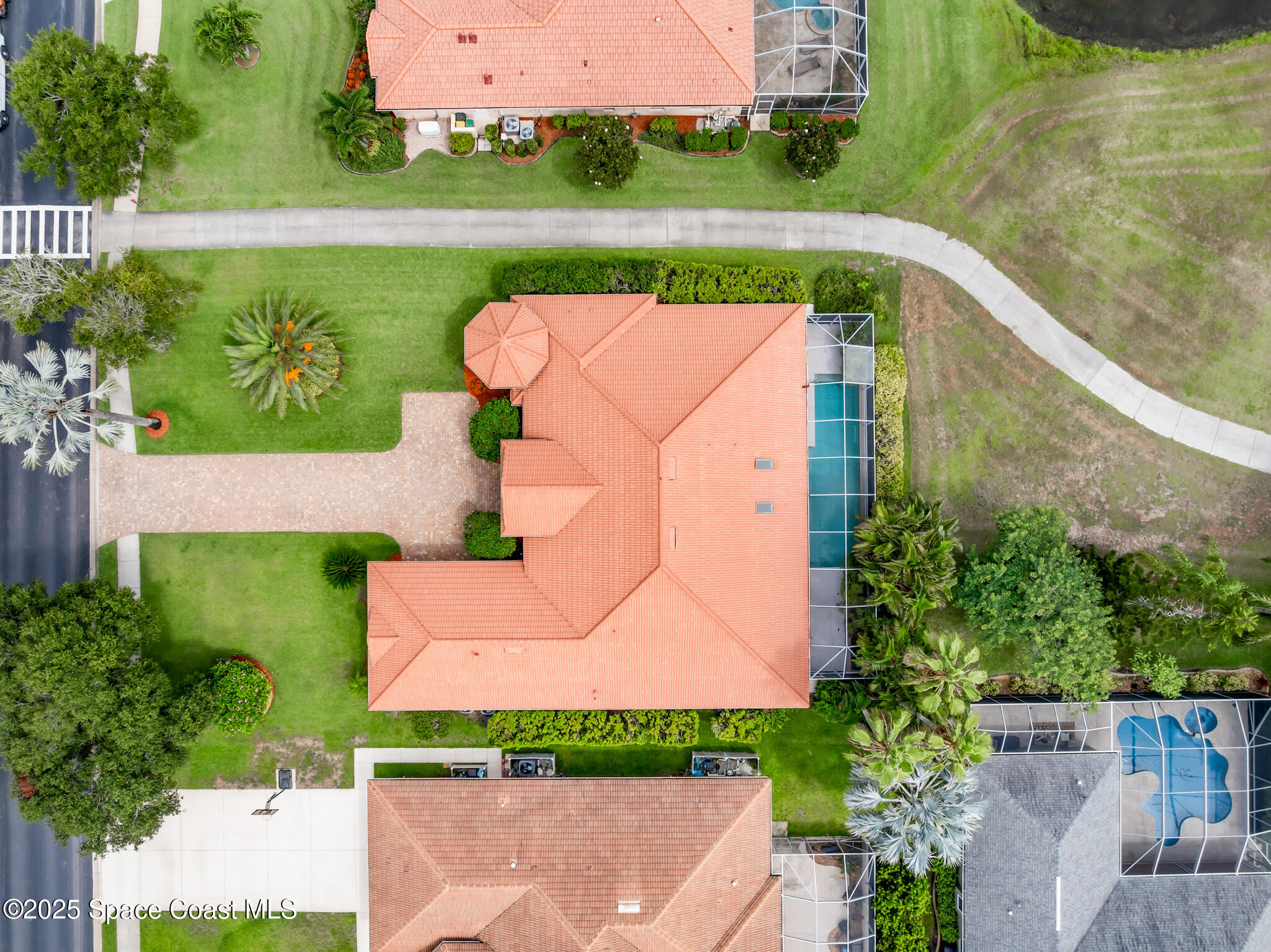 425 Baytree Drive Melbourne, FL 32940 - Photo 50 of 53 an aerial view of a house having outdoor space