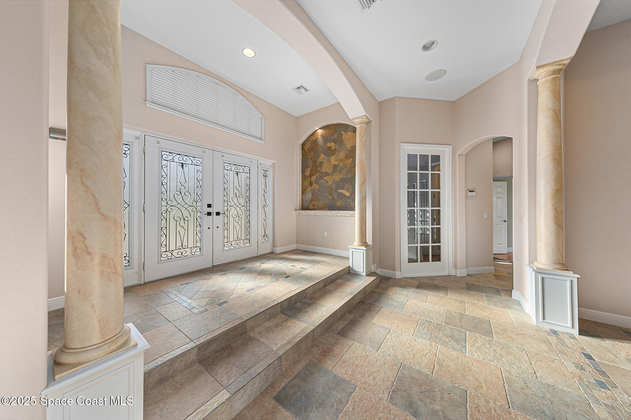 425 Baytree Drive Melbourne, FL 32940 - Photo 5 of 53 a view of livingroom with hardwood floor and front door