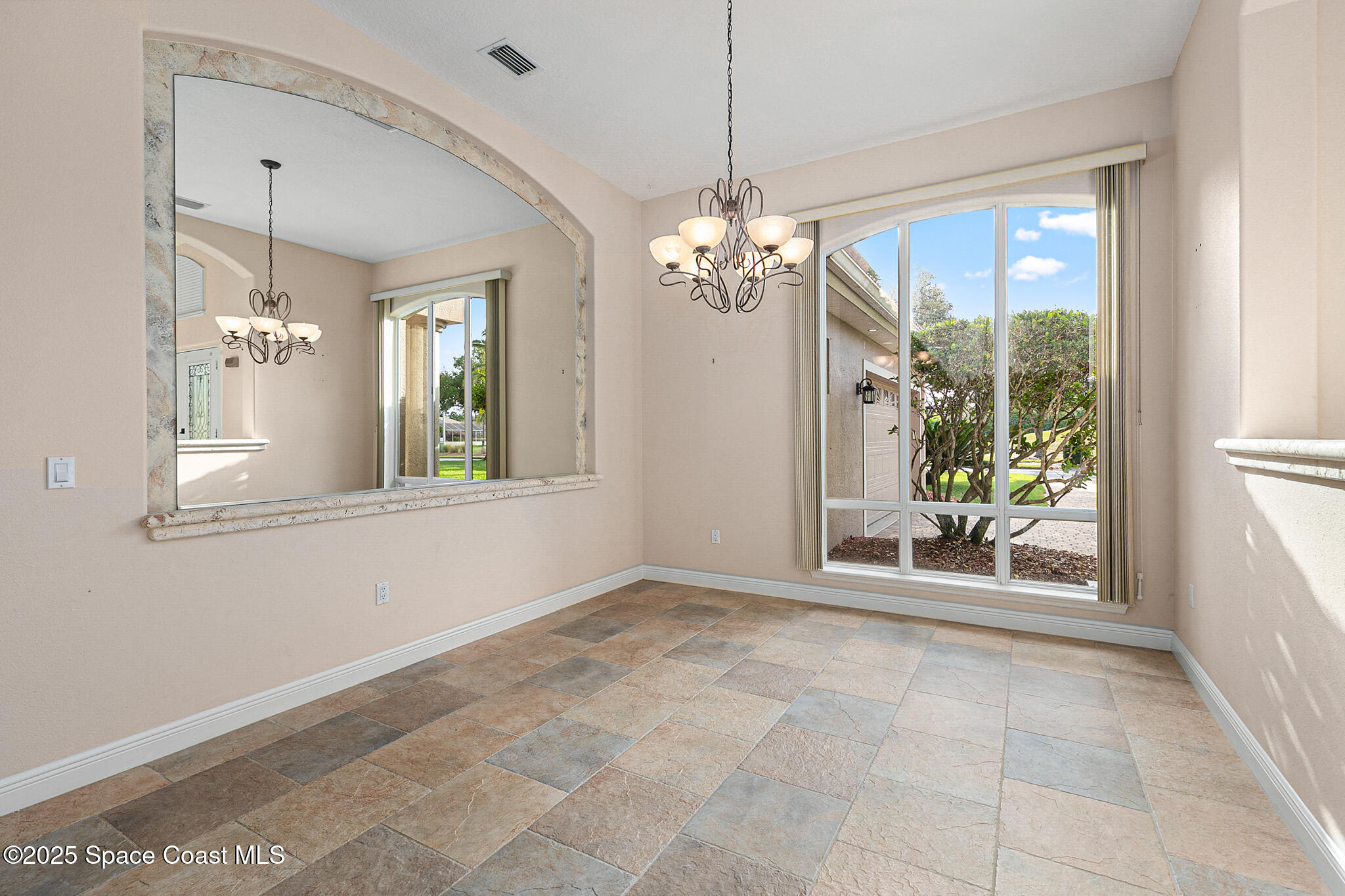 425 Baytree Drive Melbourne, FL 32940 - Photo 9 of 53 a view of livingroom with window