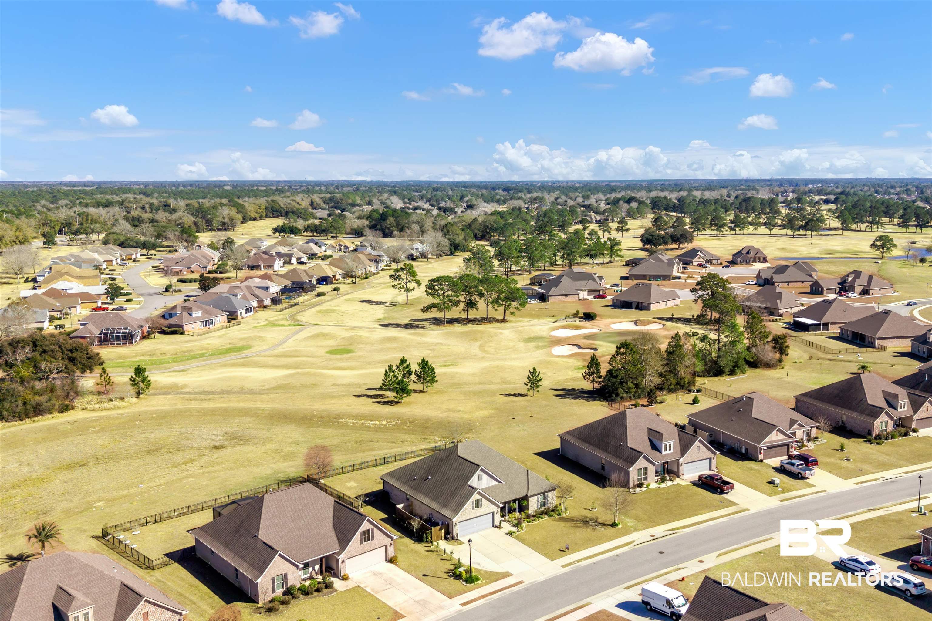 22531 Putter Lane Foley, AL 36535 - Photo 37 of 43 Aerial perspective of suburban area featuring a golf course