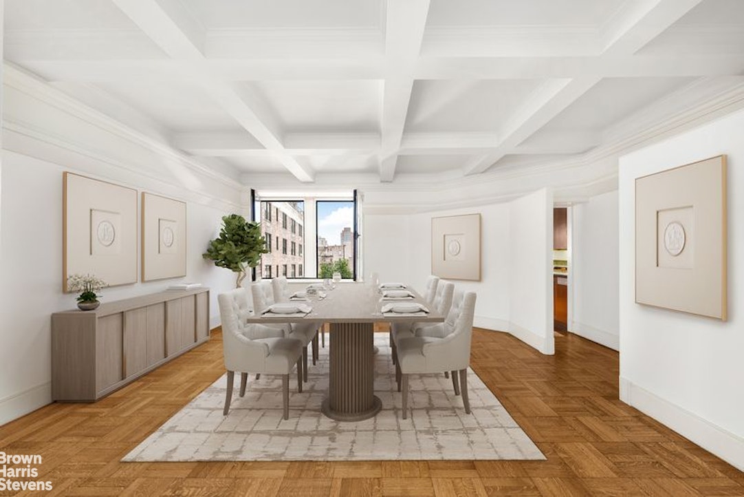1133 5th Avenue, Unit 7A Manhattan, NY 10128 - Photo 5 of 12 a dining room with chandelier and wooden floor