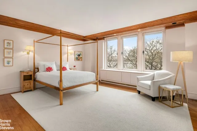 a living room with fireplace furniture and a flat screen tv