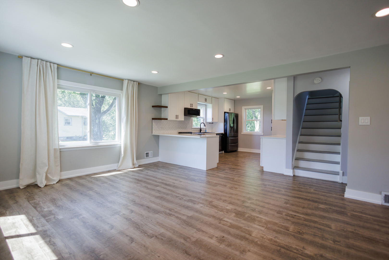 855 East 5000S Road Kankakee, IL 60901 - Photo 9 of 48 a view of a kitchen with wooden floor and a window
