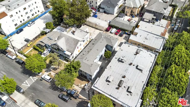 an aerial view of residential house with an outdoor space