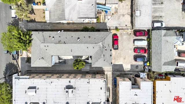 a street view with building and trees