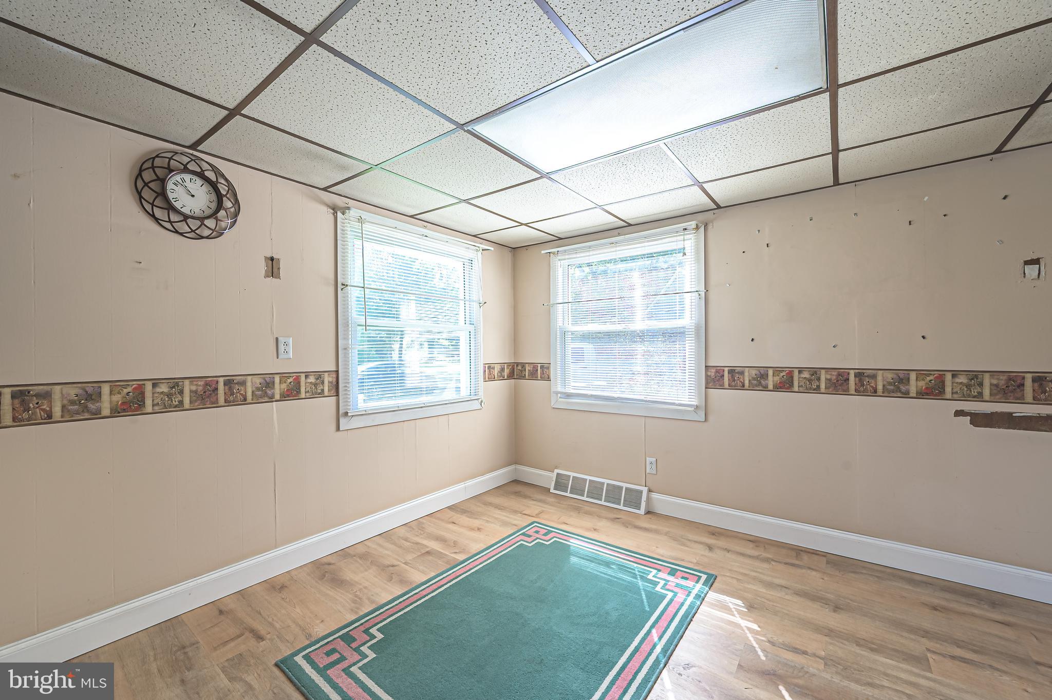 311 Woodruff Carmel Road Bridgeton, NJ 08302 - Photo 11 of 40 a view of a room with window and wooden floor