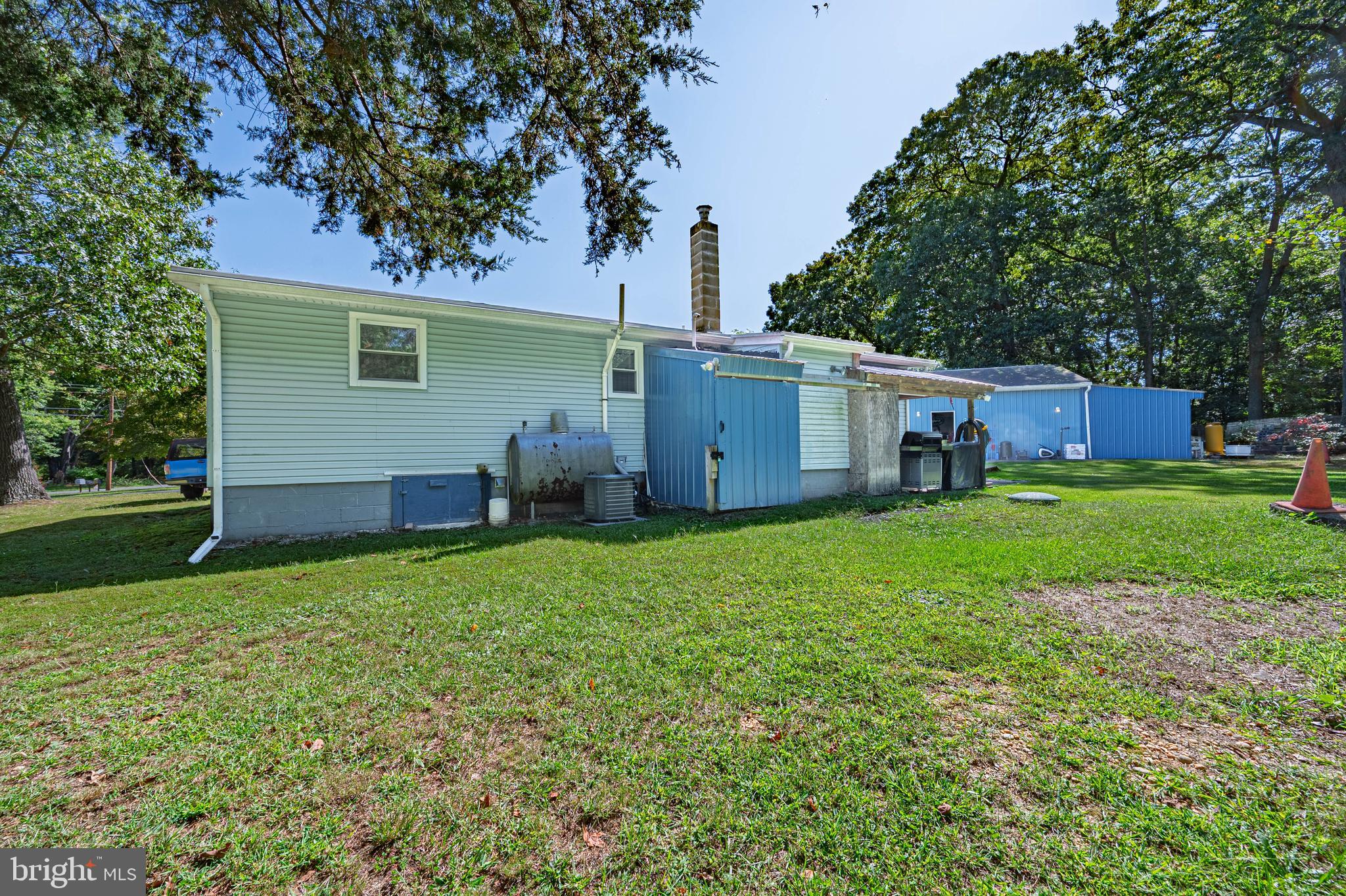 311 Woodruff Carmel Road Bridgeton, NJ 08302 - Photo 24 of 40 a view of a house with backyard and tree