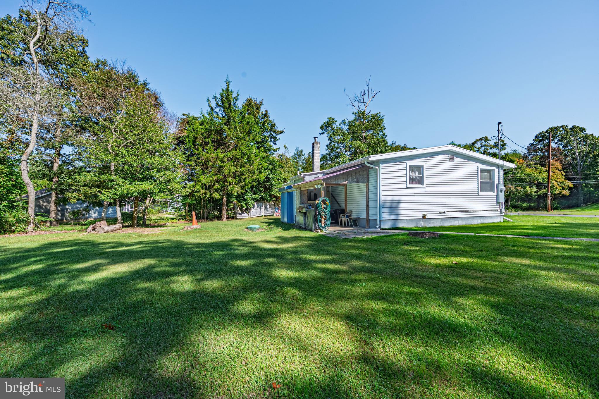 311 Woodruff Carmel Road Bridgeton, NJ 08302 - Photo 25 of 40 a view of a house with a backyard