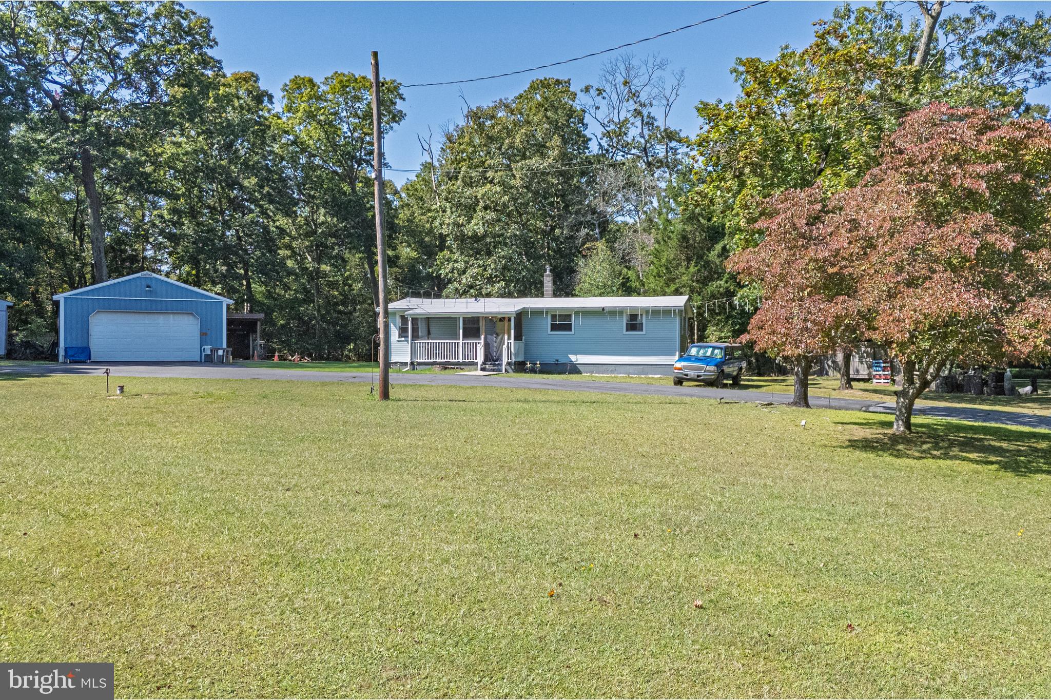 311 Woodruff Carmel Road Bridgeton, NJ 08302 - Photo 28 of 40 a view of a house with a yard