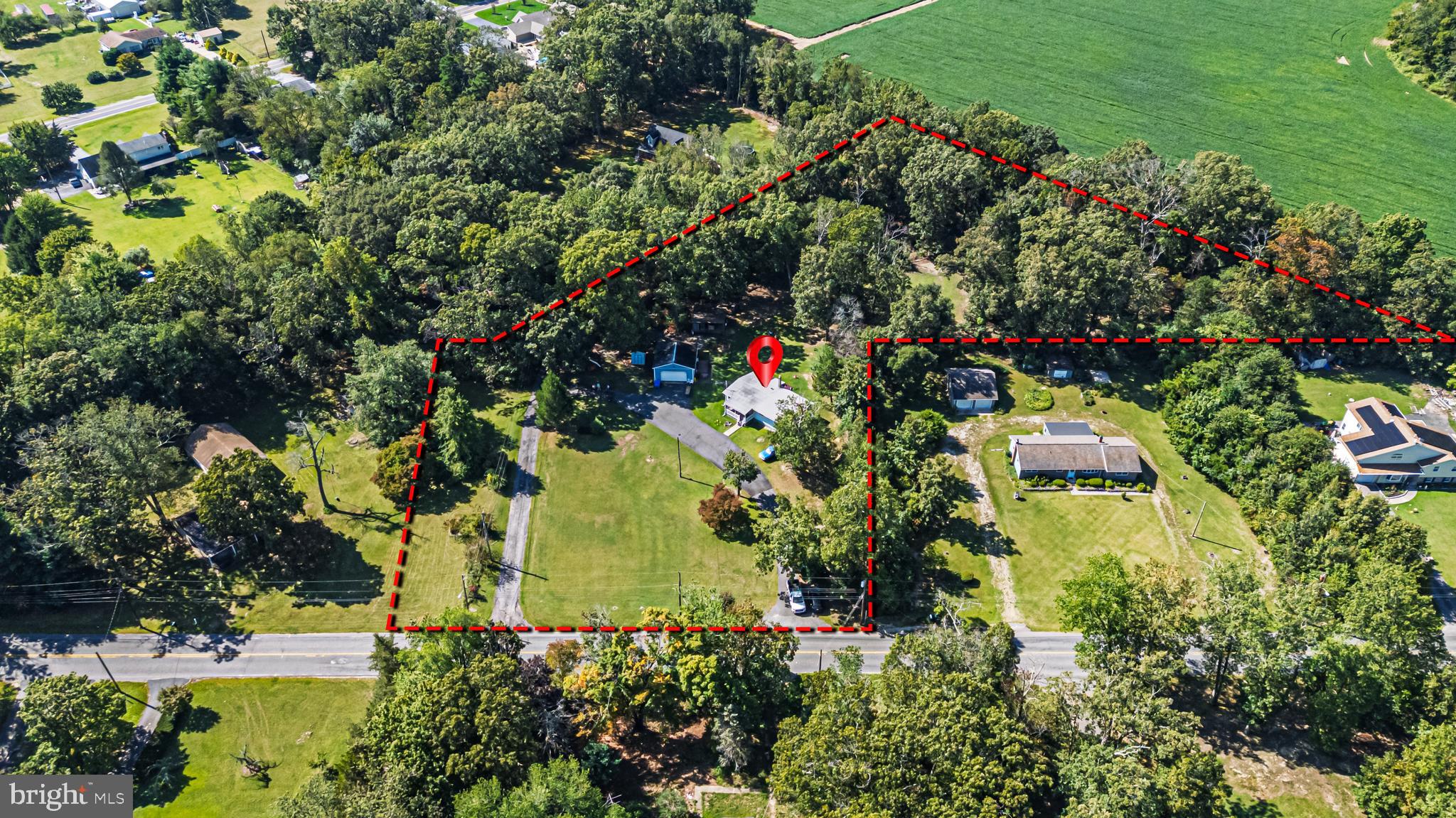 311 Woodruff Carmel Road Bridgeton, NJ 08302 - Photo 32 of 40 an aerial view of a residential houses with outdoor space and trees all around