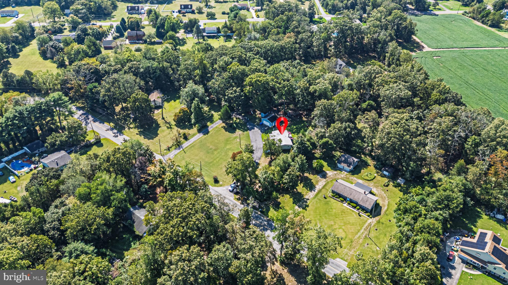 311 Woodruff Carmel Road Bridgeton, NJ 08302 - Photo 33 of 40 an aerial view of residential house with outdoor space and trees all around