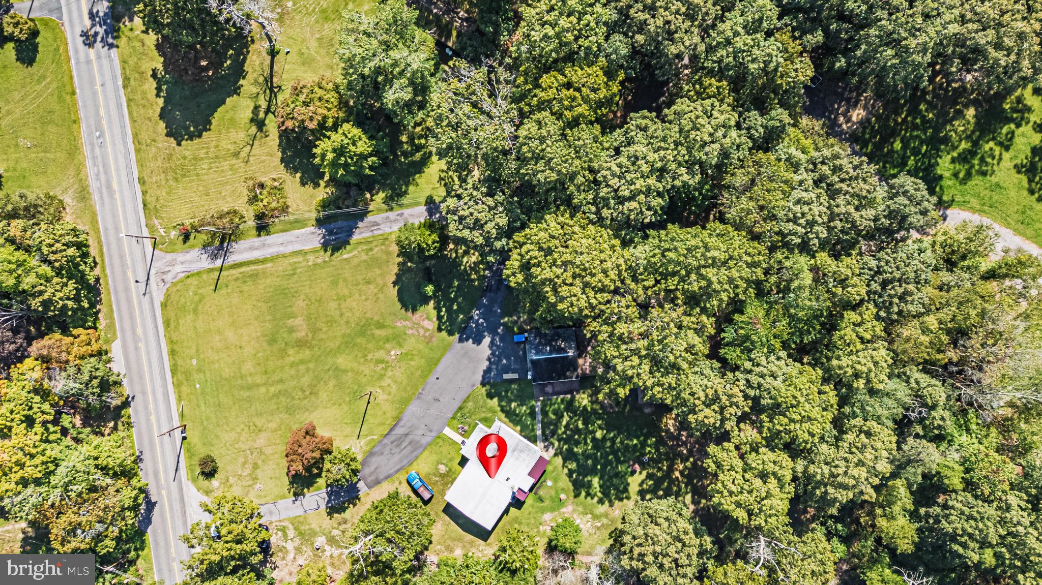 311 Woodruff Carmel Road Bridgeton, NJ 08302 - Photo 35 of 40 an aerial view of residential house with swimming pool and swimming pool