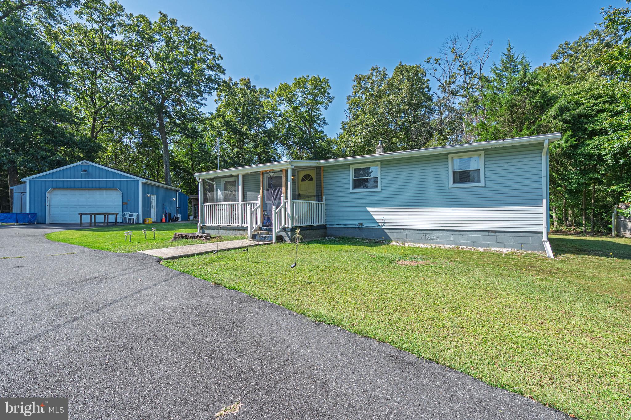 311 Woodruff Carmel Road Bridgeton, NJ 08302 - Photo 4 of 40 a view of a house with a backyard