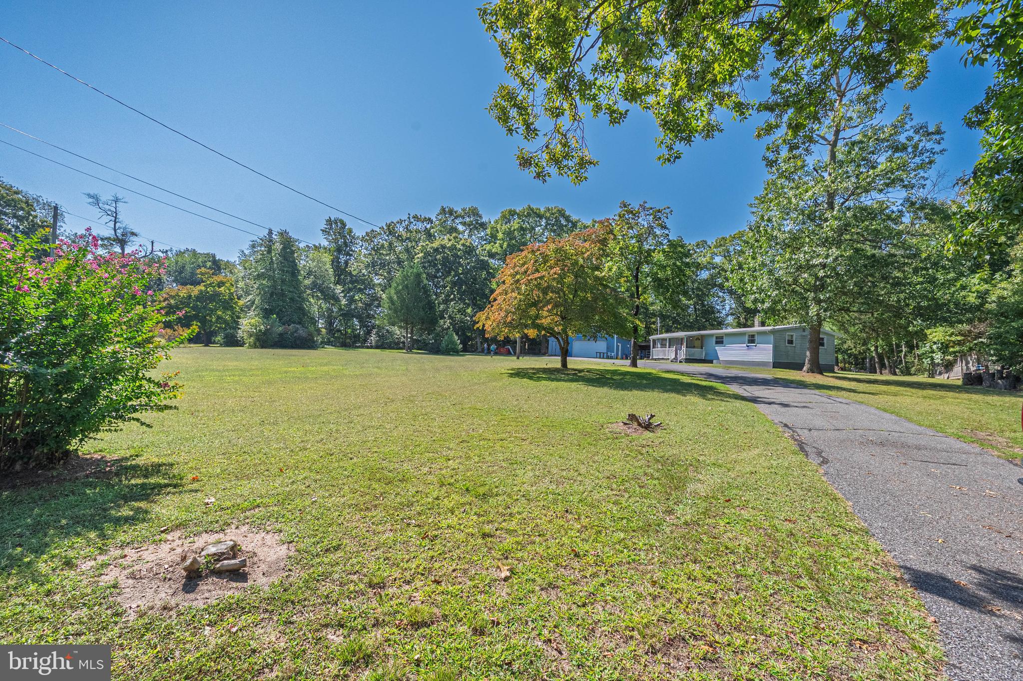 311 Woodruff Carmel Road Bridgeton, NJ 08302 - Photo 5 of 40 a view of a swimming pool with a yard