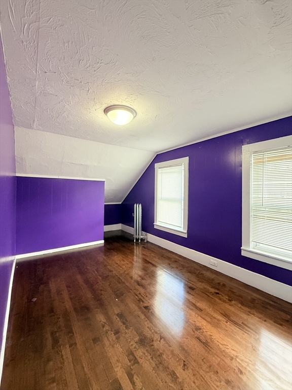 139 Endicott Street Worcester, MA 01610 - Photo 7 of 9 a view of an empty room with window
